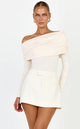 Hallie Bodysuit - One Shoulder Draped Long Sleeve Bodysuit in Cream